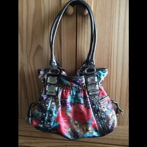 Floral shoulder bag by Kathy Van Zeeland